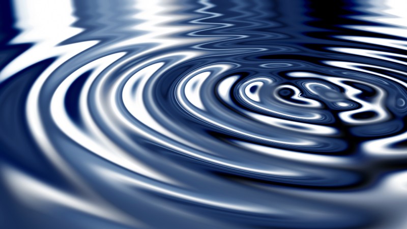 Blog Ambiental • Ondas abstratas em tons de azul representando energia e movimento oceânico.