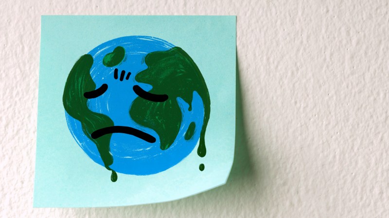 Blog Ambiental • Ilustração do planeta Terra triste simbolizando impactos ambientais e sofrimento ecológico
